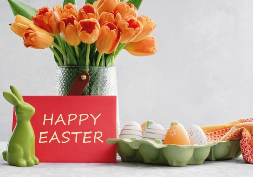 A vase of orange tulips, a 