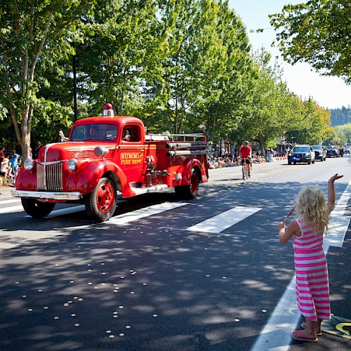 Old red firetruck in a parade